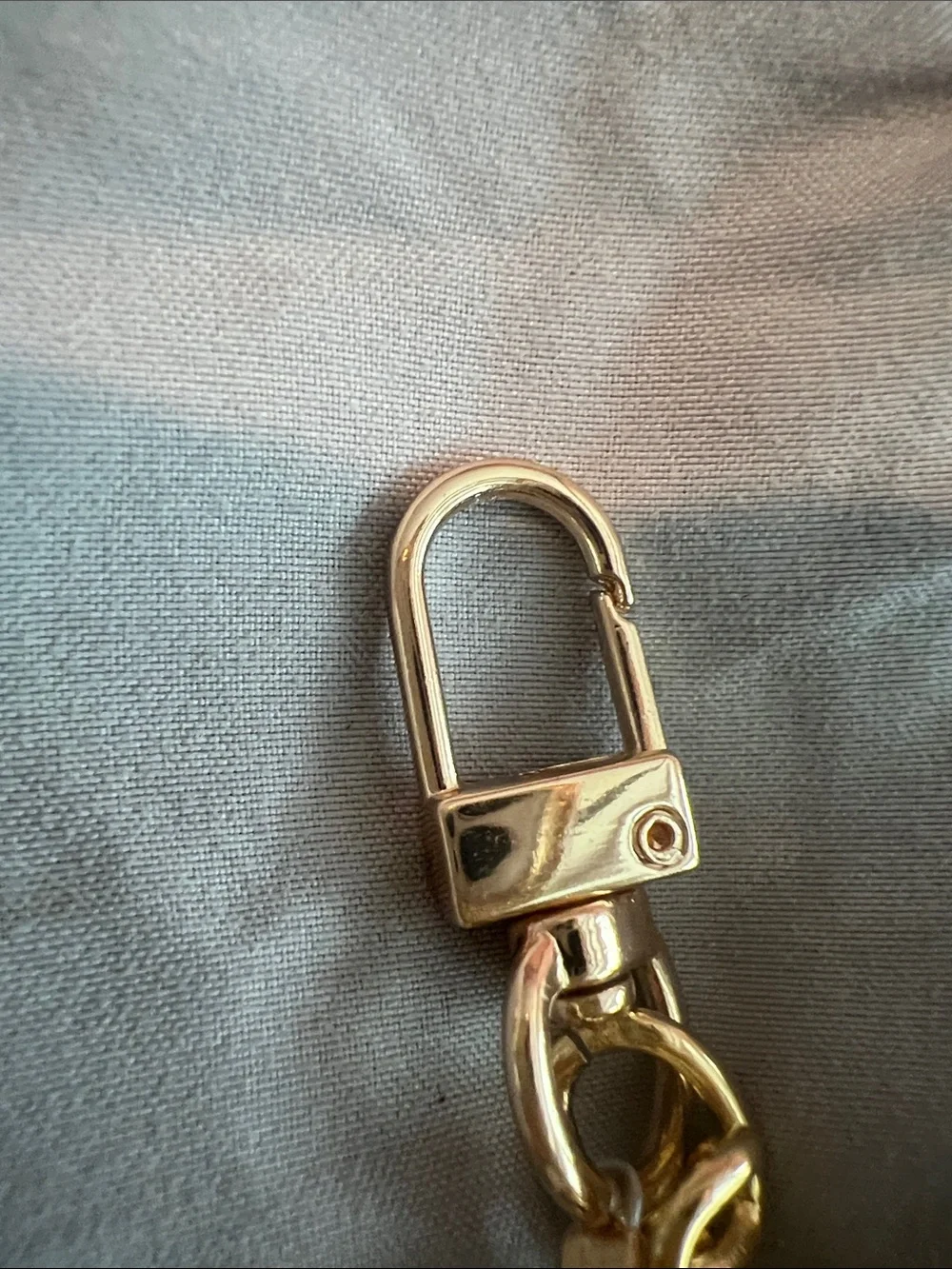 Beginning Boutique Gold Chain and White Pearl Strap bag charm